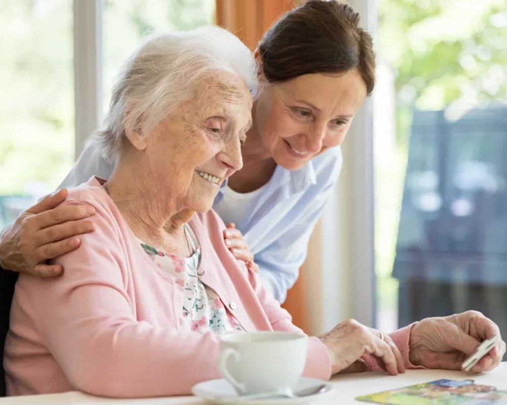 Residents work on a jigsaw puzzle at The Preserve of Roseville in Roseville, Minnesota.