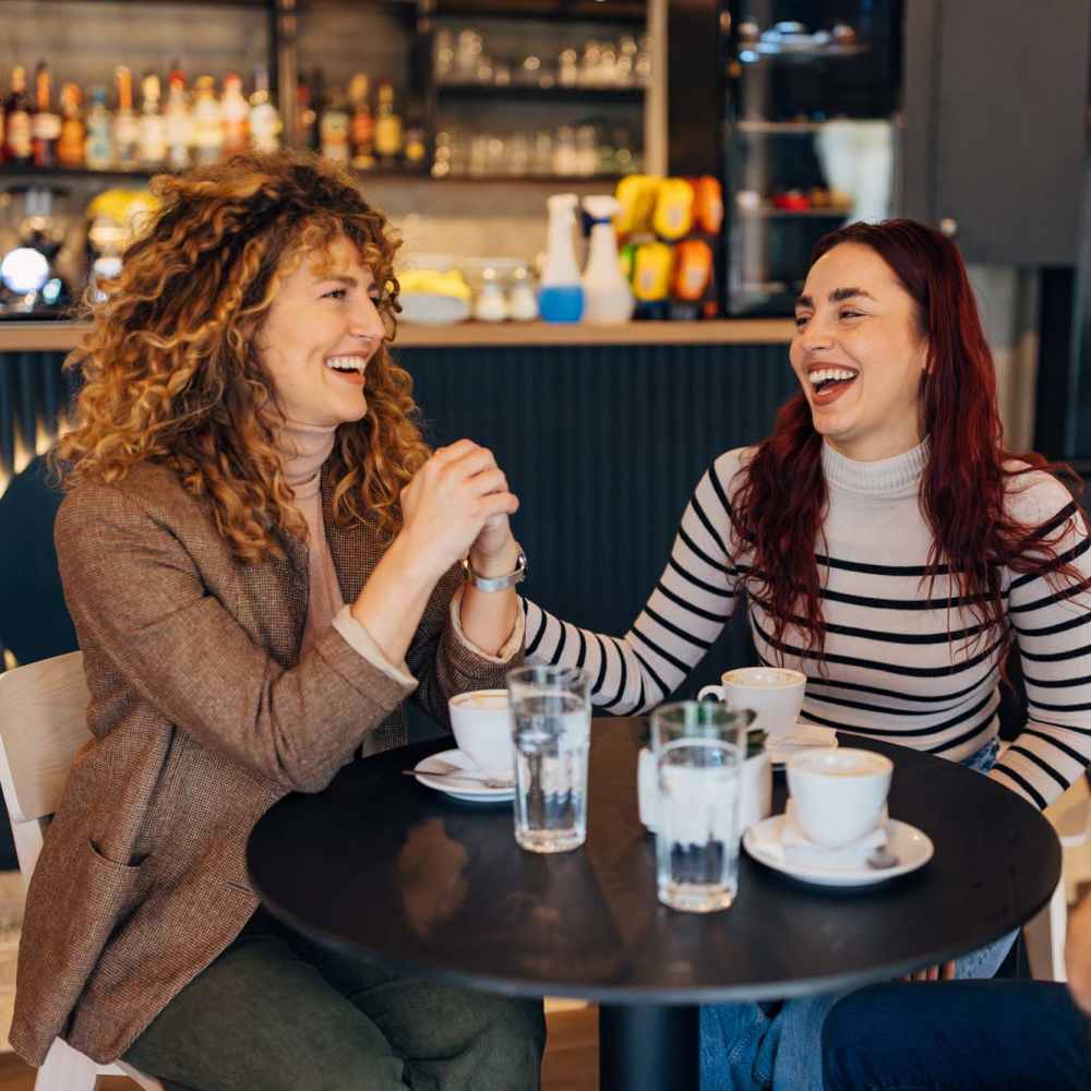 Residents having their favorite drink at a cafe nearby Manistique Lakeview in Manistique, Michigan