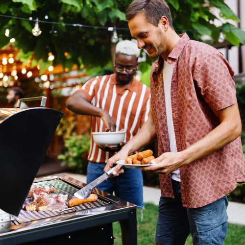 Friends enjoying the bbq at The View at Wash Park in Denver, Colorado