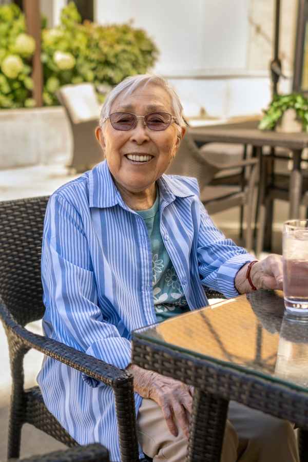 Smiling resident at Merrill Gardens at Tukwila in Tukwila, Washington