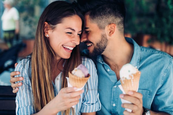 Couple enjoying ice cream near The Fairway Apartments in Salem, Oregon