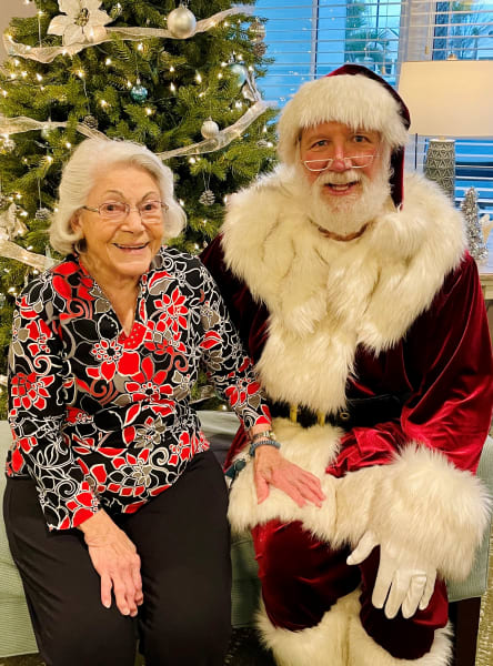 A Carolina Park (SC) resident takes a photo with Santa Claus!