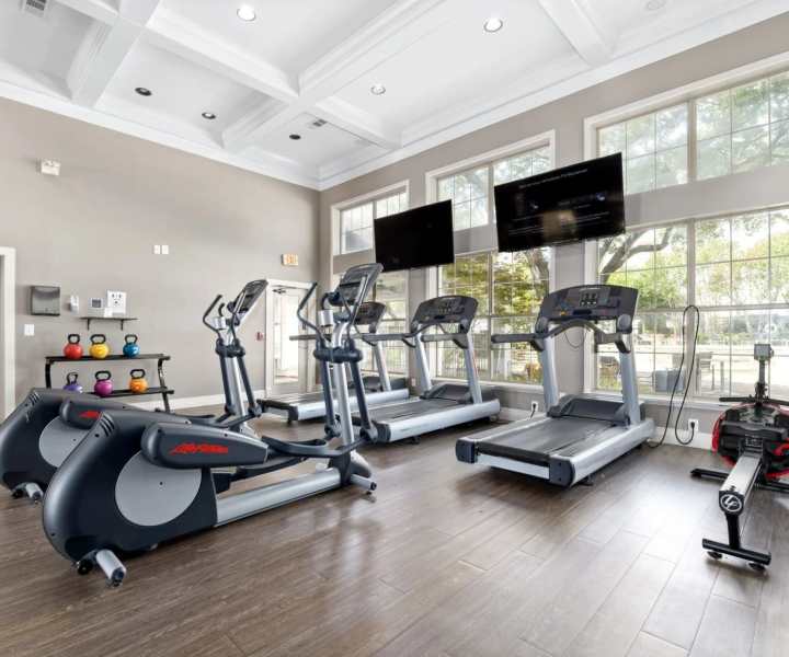 Fitness center with treadmill at Reeves and Wells in Dallas, Texas