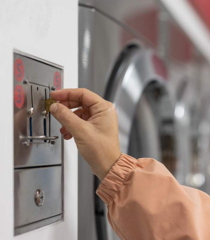 Residents using laundry facility at The Kensley in Spanish Fort, Alabama
