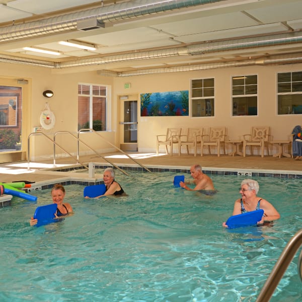 Residents exercising in the pool at Quail Park at Browns Point in Tacoma, Washington