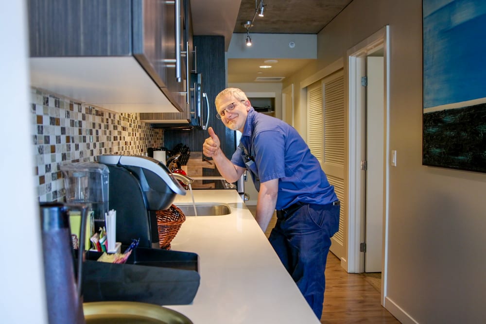 Pillar Properties in Seattle, Washington team members in an office kitchen