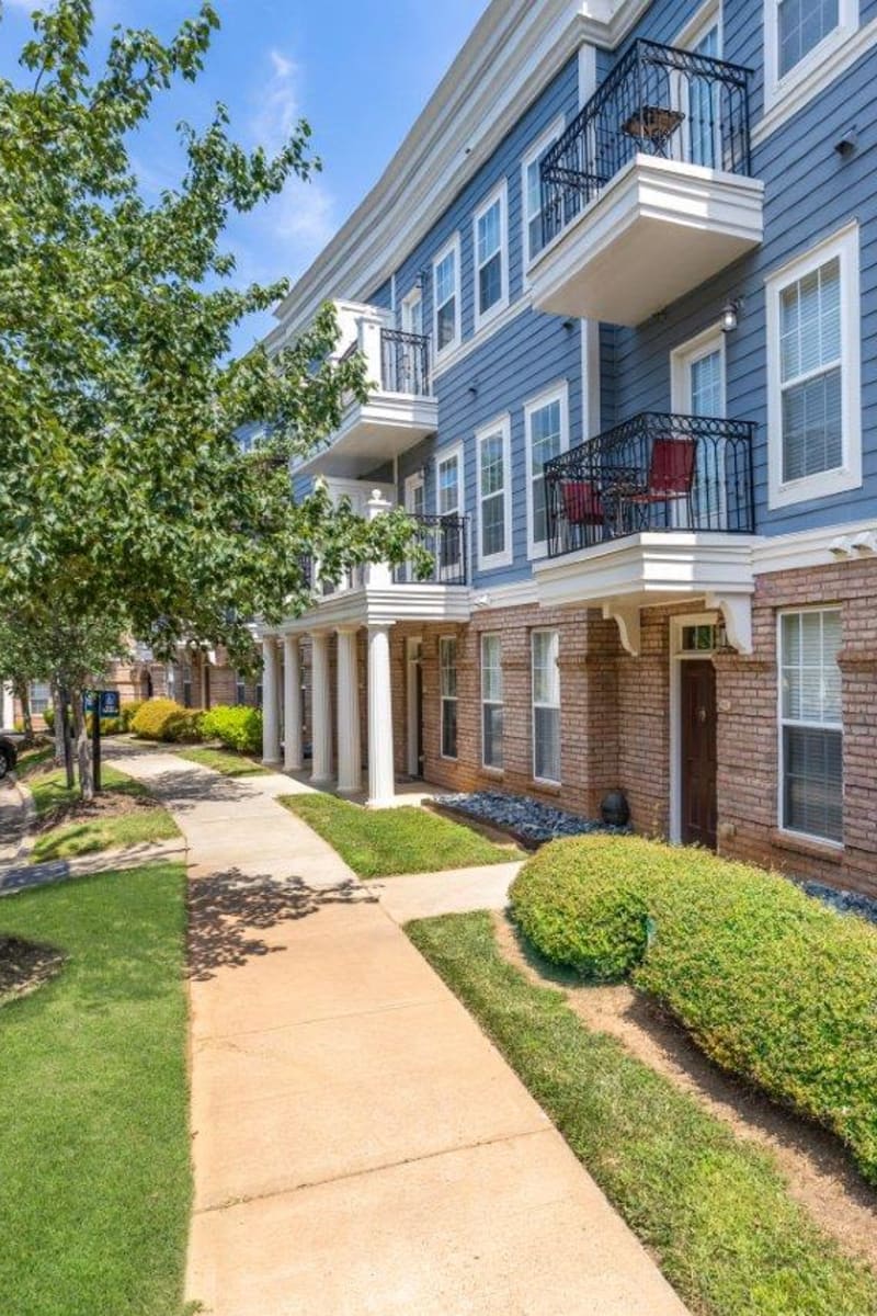 Exterior of Worthington Apartments & Townhomes on a sunny spring day in Charlotte, North Carolina