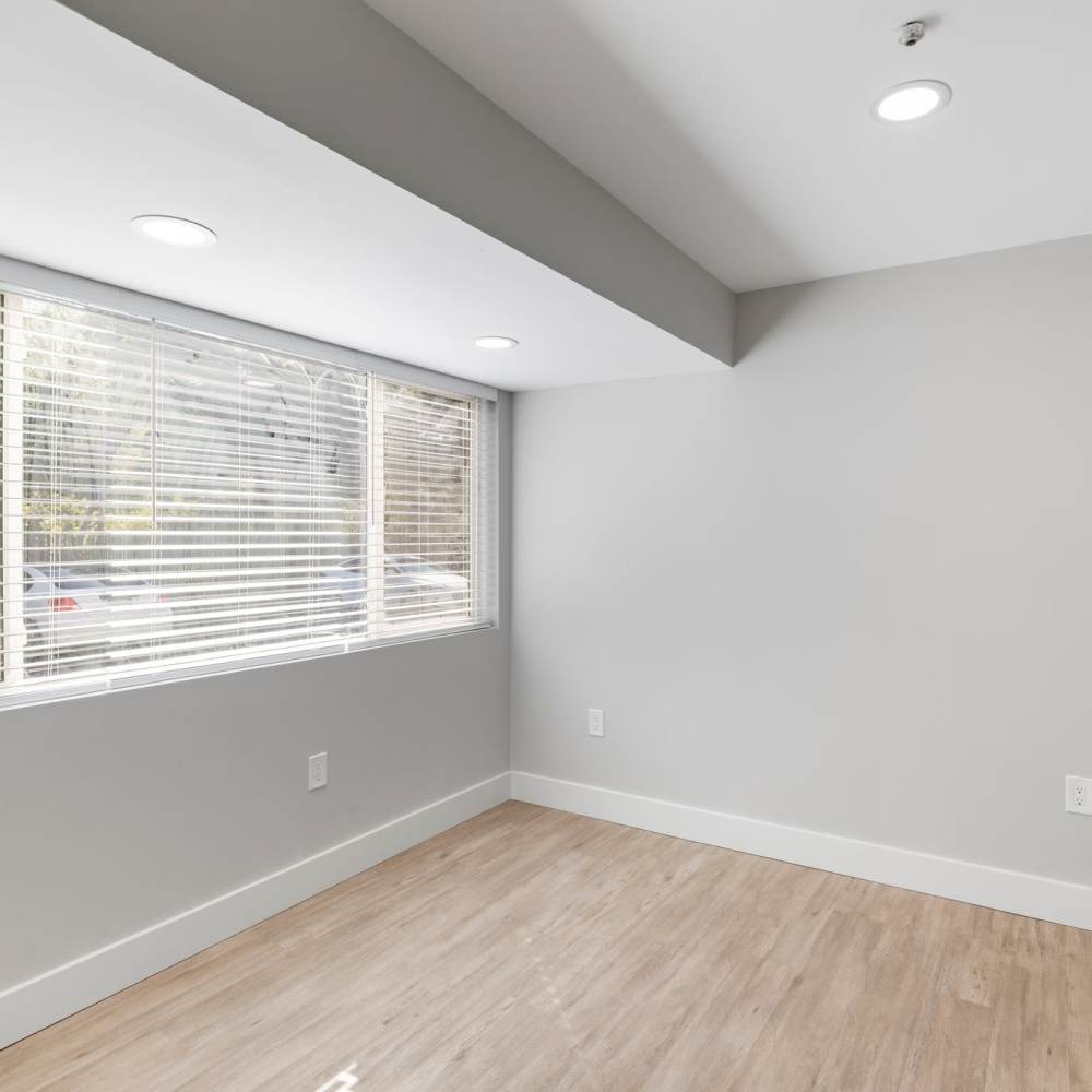 Well-lit apartment bedroom at Crossbrook Apartments in Rohnert Park, California