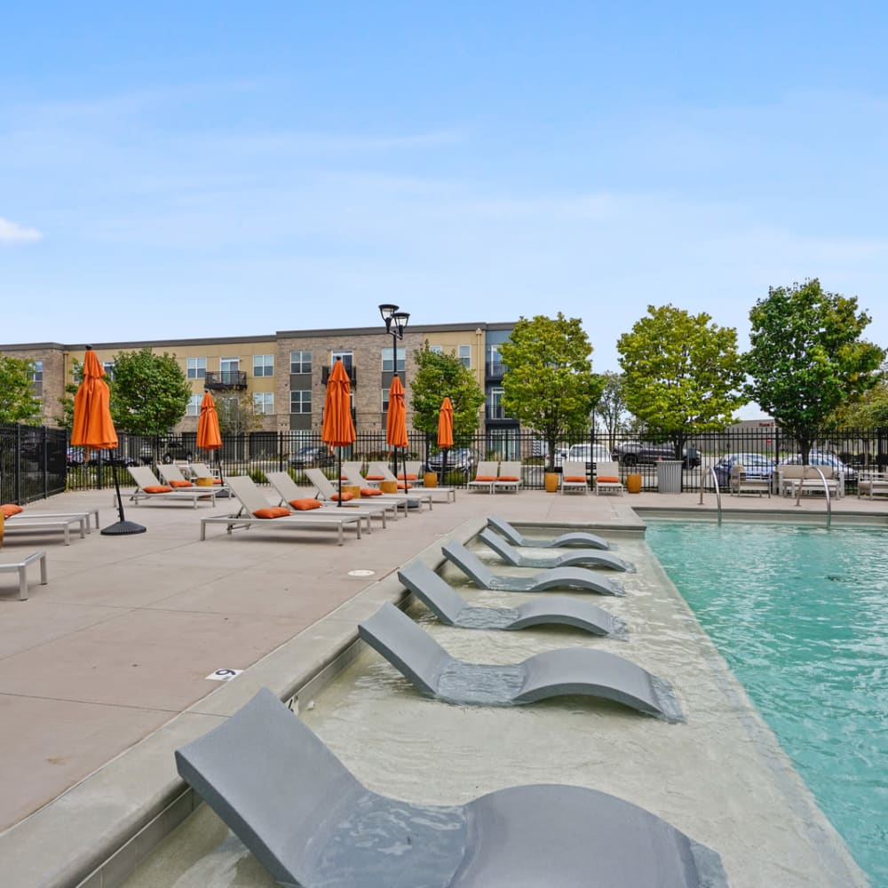 Pool with water chairs at Penn Circle in Carmel, Indiana