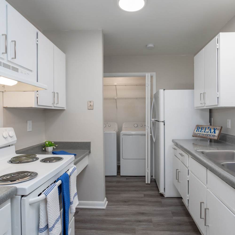 Kitchen with close access to washer and dryer at Landmark Flats in Fayetteville, North Carolina