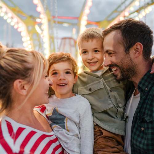 Resident family outside at Fox Pointe Apartments in Columbus, Indiana