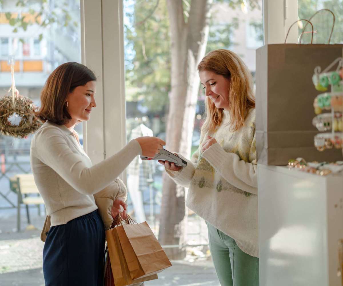Resident woman doing payment in a nearby shop at Slate Run in Miamisburg, Ohio