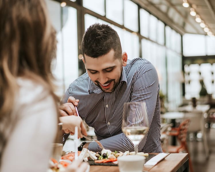 Resident couple dining out near Sofi Highlands in San Diego, California