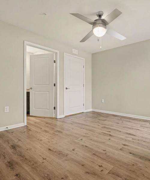 Beautiful bedroom with a ceiling fan at Leonard Greene in Dallas, North Carolina