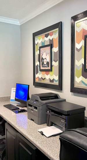 Business center with computers and copiers at The Abbey at Medical Center in San Antonio, Texas  