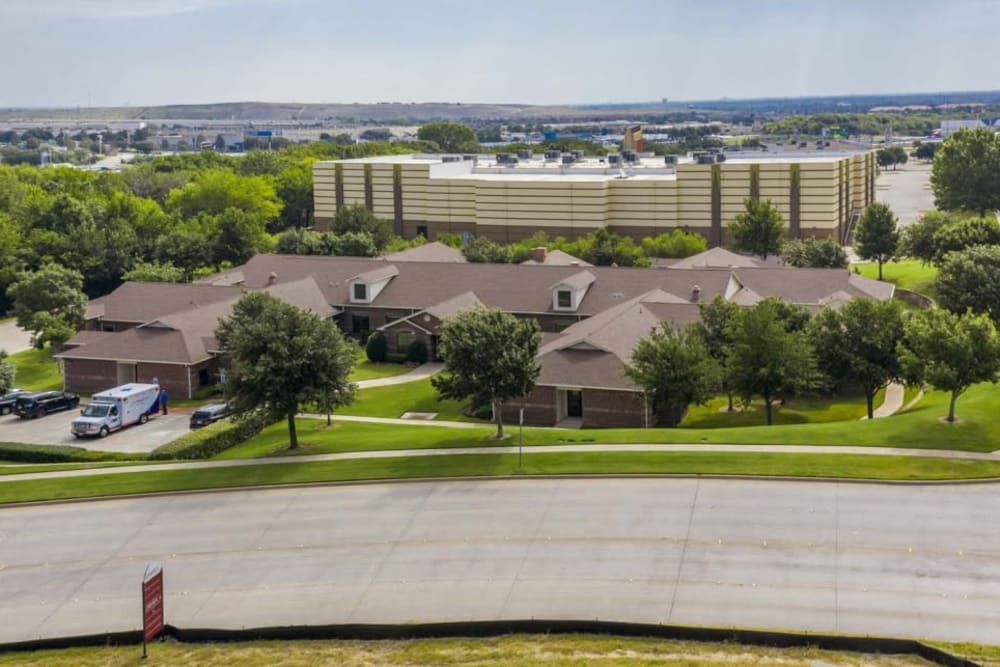 Exterior on a sunny day at RockBrook Memory Care in Lewisville, Texas