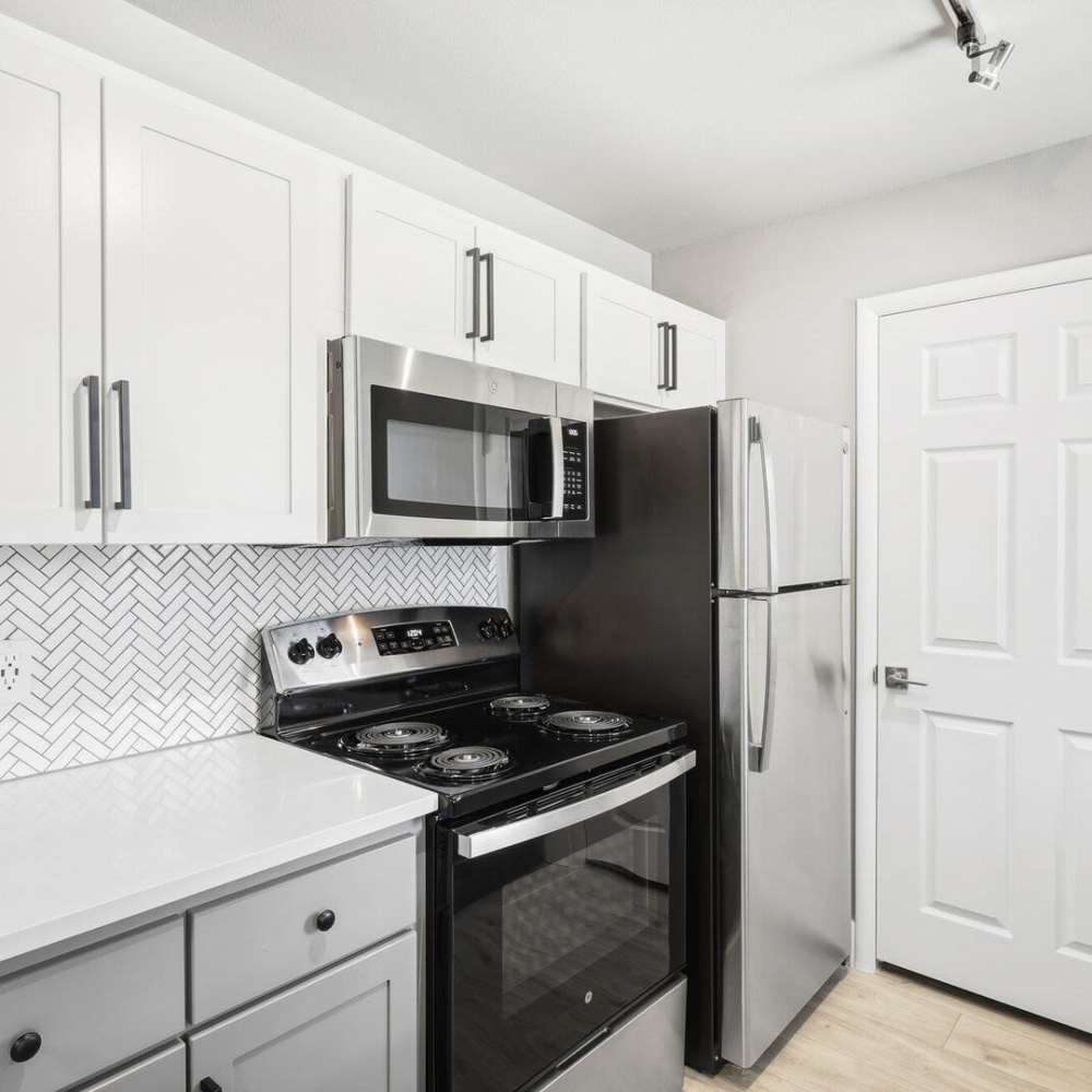 Kitchen with refrigerator at Paseo Park in Glendale, Arizona