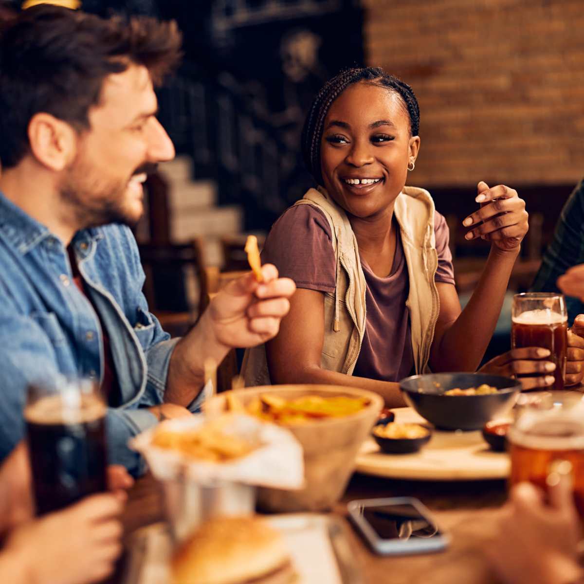 Residents enjoying food and drinks near Encore at Westgate in Leland, North Carolina