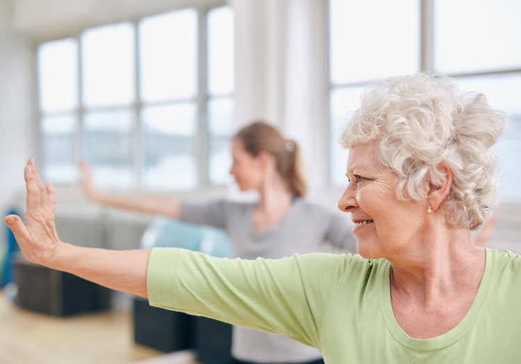 Seniors practicing yoga at Dale Commons in Modesto, California