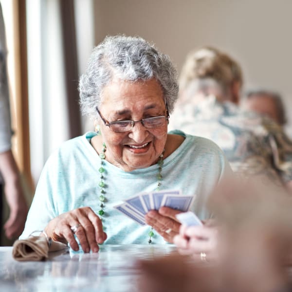 A resident playing cards at Monte Vista Village in Lemon Grove, California