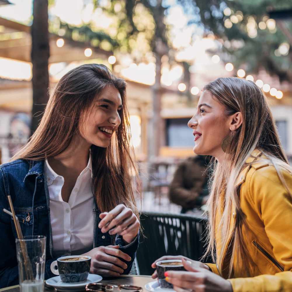 Resident friends having coffee near Workhouse at Union Terminal in Jacksonville, Florida