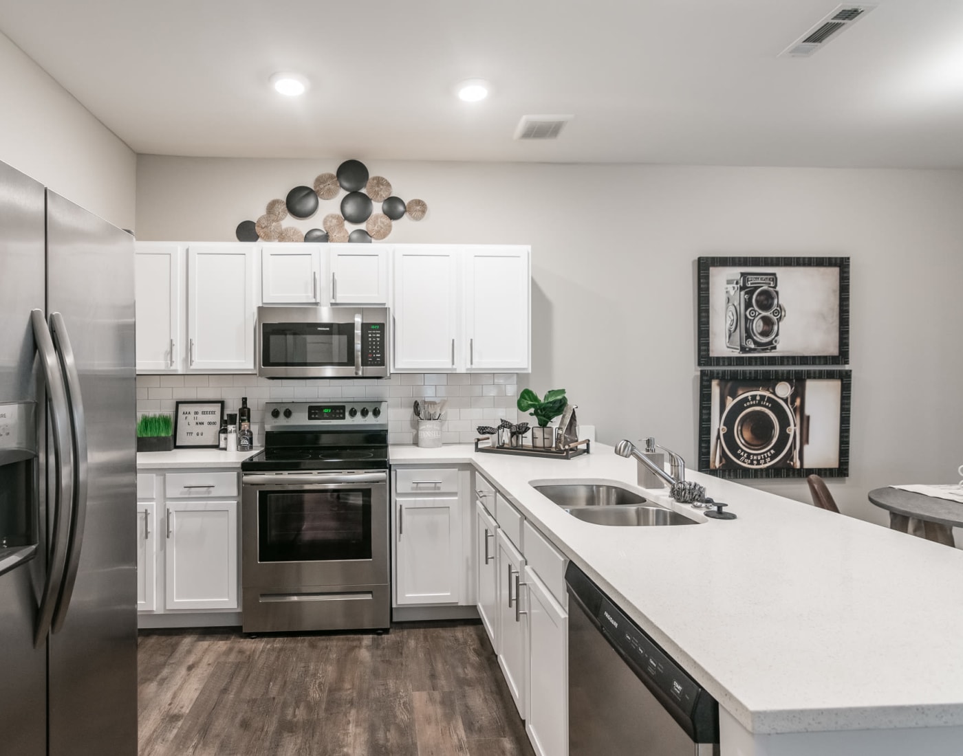 Kitchen with a breakfast bar and stainless steel appliances at Kirkwood Place in Clarksville, Tennessee
