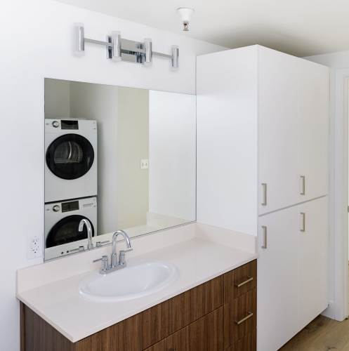 Bathroom with lots of storage at 1801L Apartments in Sacramento, California