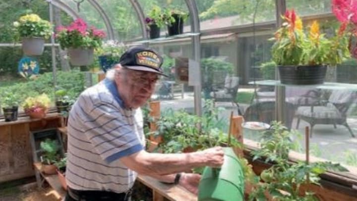 resident gardening at community