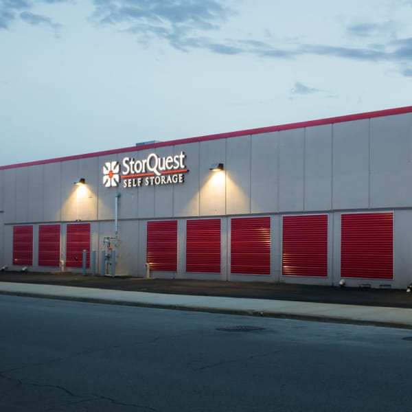 Exterior storage units with red doors at StorQuest Self Storage in Long Beach, New York