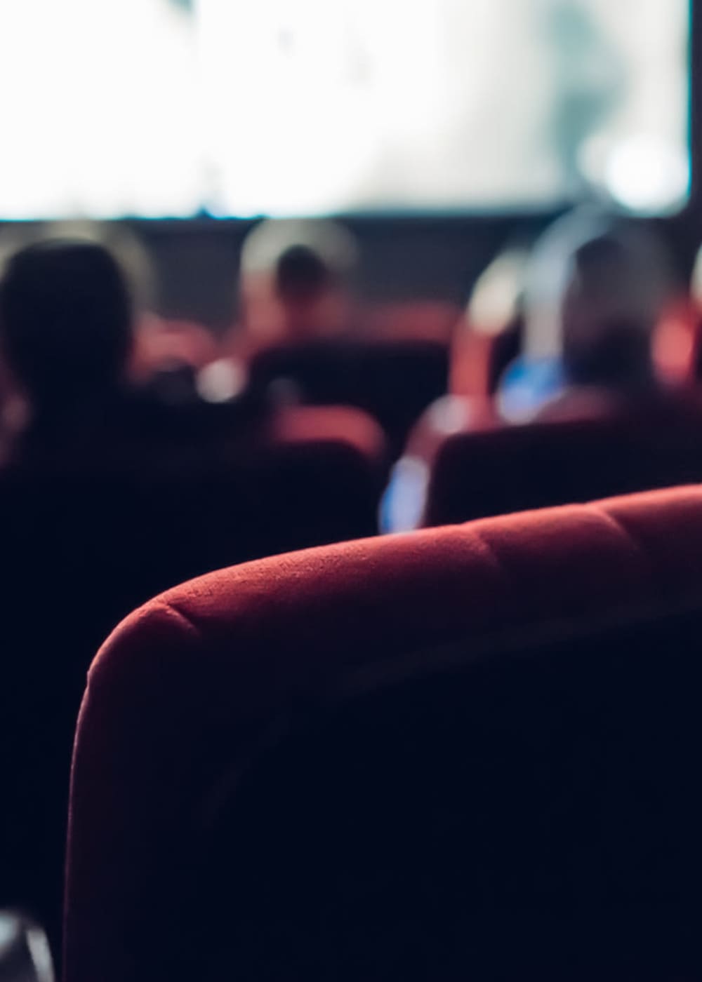 Residents bonding in a movie theatre near Allure at Camarillo in Camarillo, California