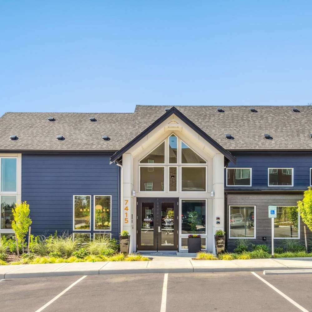 Exterior shot of the clubhouse at Arrow Apartments in Lacey, Washington