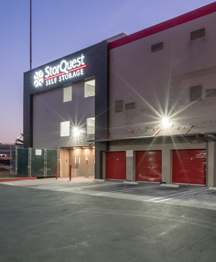The main entrance and exterior units at twilight at StorQuest Self Storage in Los Angeles, California