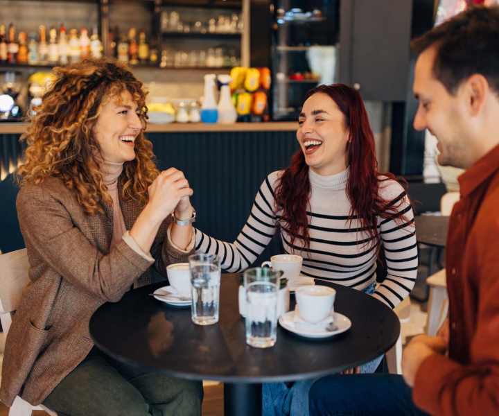 Happy resident family at restaurant close to Fox Club in Capitol Heights, Maryland