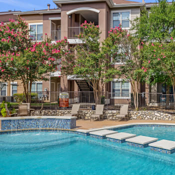 The sparkling community swimming pool at Cypress Creek at Lakeline in Cedar Park, Texas