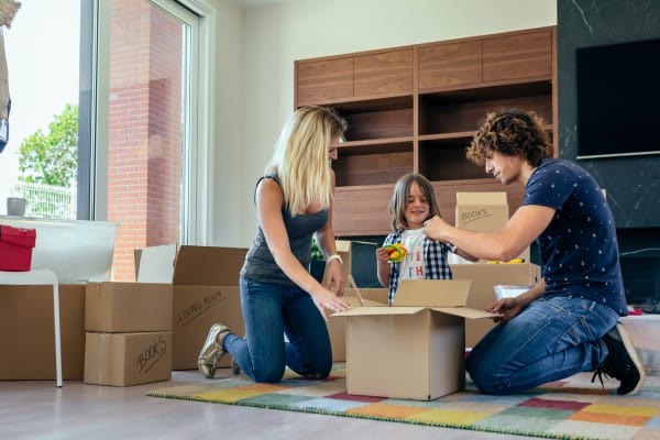 A family in Baton Rouge, Louisiana, packing their belongings for storage