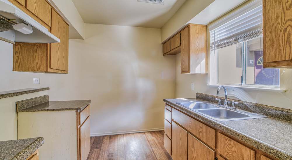Fully equipped kitchen with a eco-friendly flooring at Kings Villages in Pasadena, California