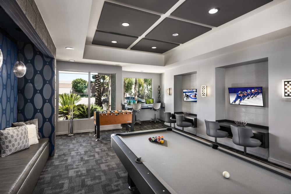 Clubhouse interior and pool table at Avenue 25 in Phoenix, Arizona