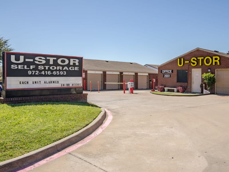 A view of the leasing office and sign at U-Stor Trinity Mills in Carrollton, Texas