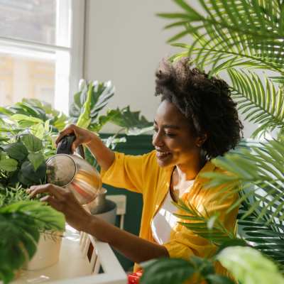 A resident cares for her house plants at Eagle Pointe, Knoxville, Tennessee