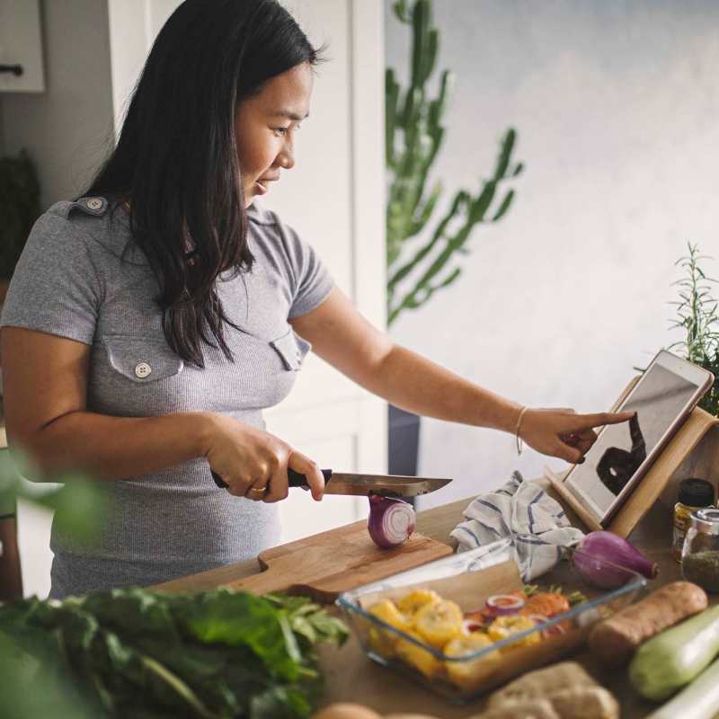 Resident chopping vegetables at Fidelis Willis in Willis, Texas