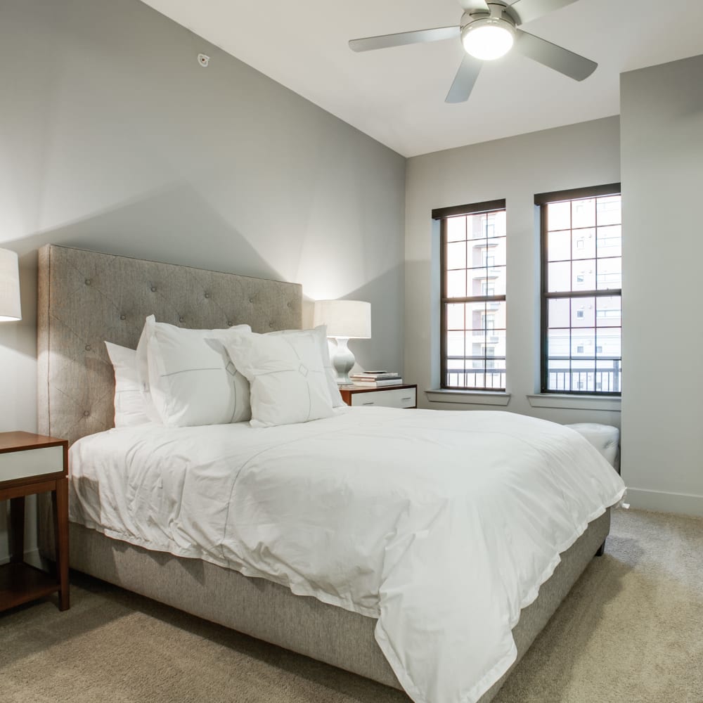 Bedroom with a ceiling fan at Cantabria at Turtle Creek in Dallas, Texas