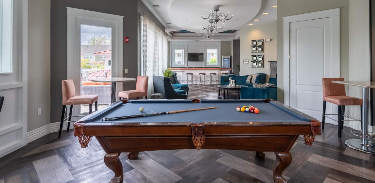 Clubhouse lounge area with Billiards table at Attain at Quarterpath, Williamsburg, Virginia