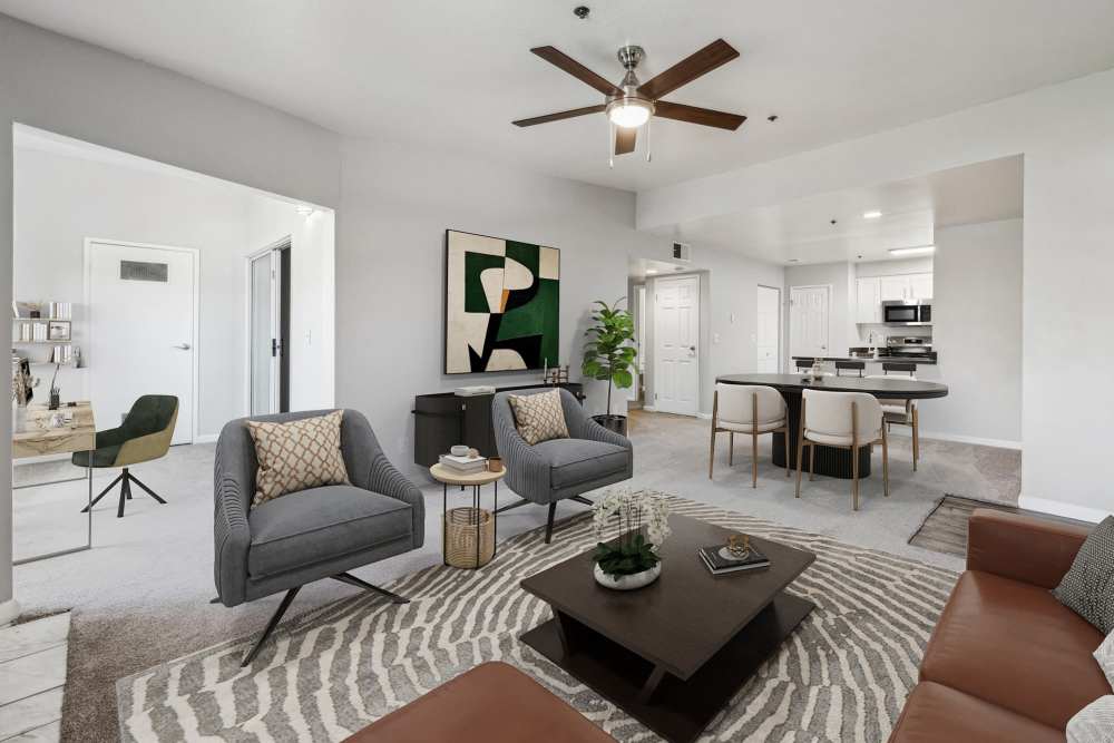 A living room with a fireplace at Sterling Heights Apartment Homes in Benicia, California