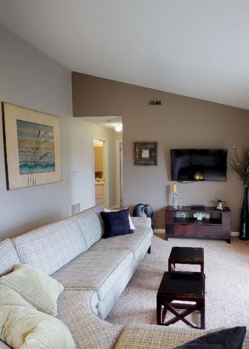 Model living room at Coventry Apartments in Williamsville, New York