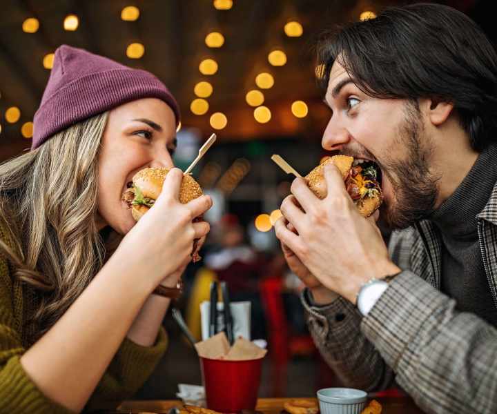 Resident couple enjoying their food at a restaurant near High Street Lofts in Petersburg, Virginia