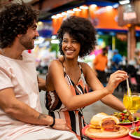 Resident couple having dinner near The Simone in Silver Spring, Maryland