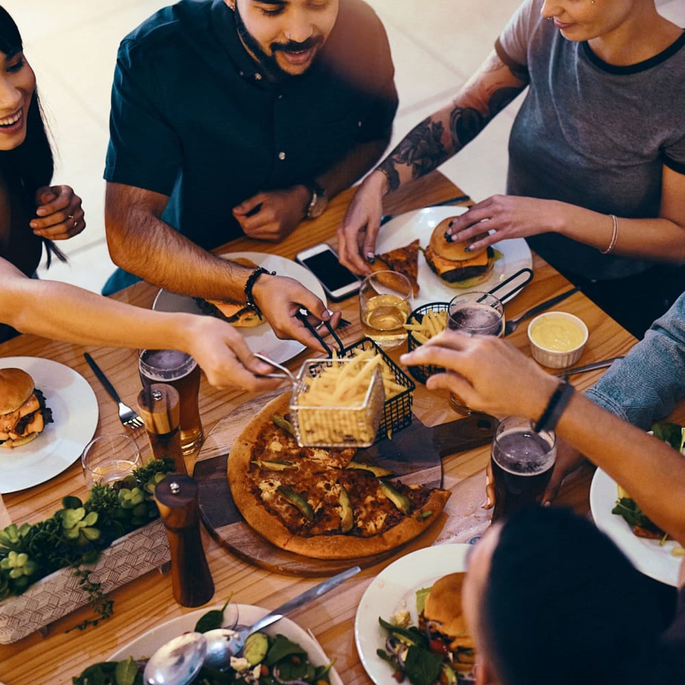 Friends meeting at a restaurant near Wisdom Place in Modesto, California
