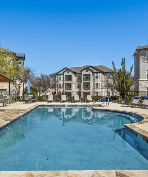 Swimming pool with patio at Collier in Pflugerville, Texas