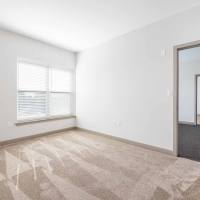Modern unfurnished bedroom at Mount Hope Lofts in Rochester, New York