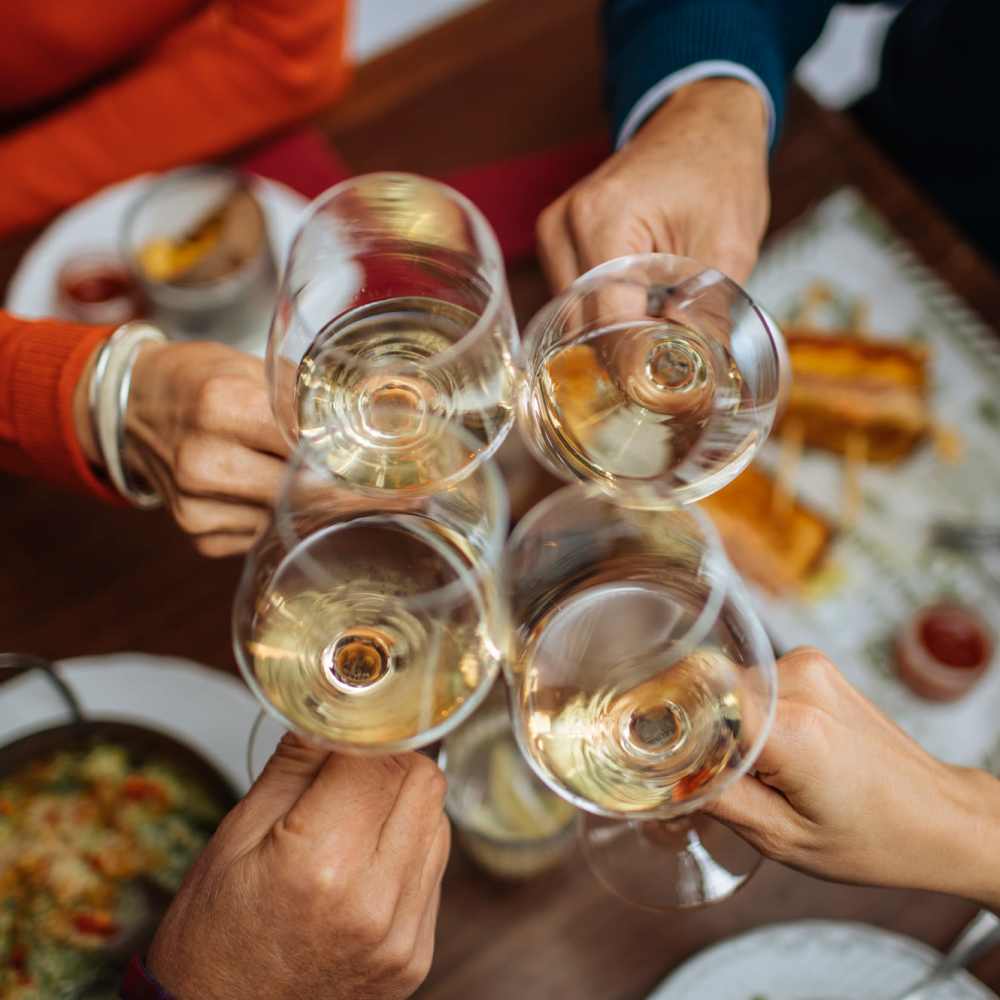 Residents toasting to the good life at their favorite night spot near The Anderson at Brooks in San Antonio, Texas